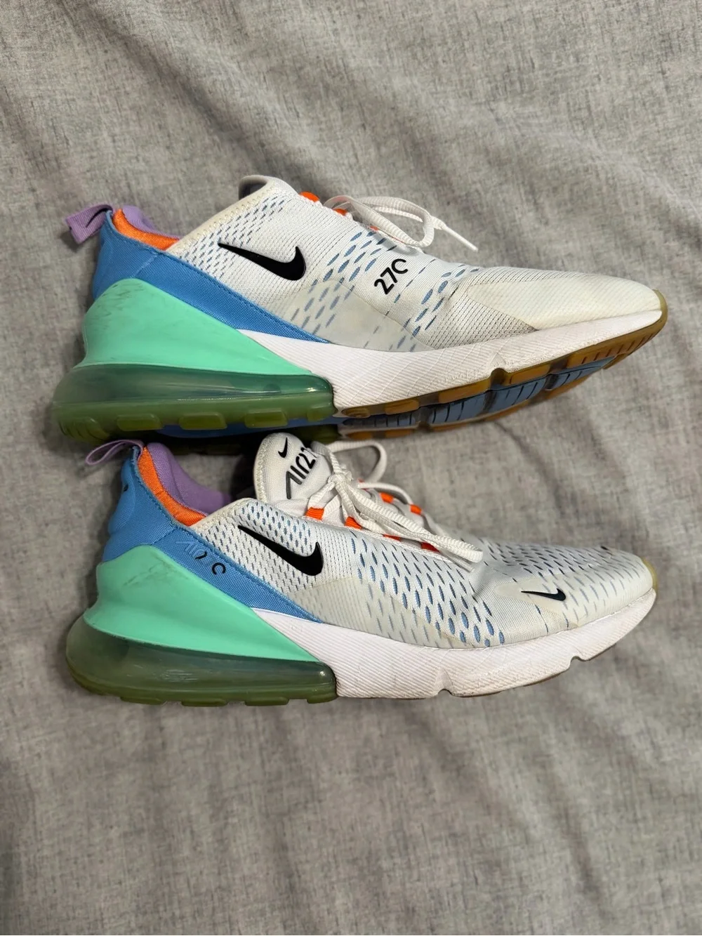 Nike White Running Sneakers with Orange Accents and Purple Lining